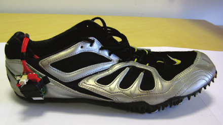 Sprinting shoe augmented with the Imperceptible On-body sensor Node (ION).