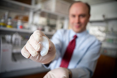 Lawrence Bonassar, associate professor of biomedical engineering, and colleagues collaborated with Weill Cornell Medical College physicians to create an artificial ear using 3-D printing and injectable molds. Lindsay France/University Photography